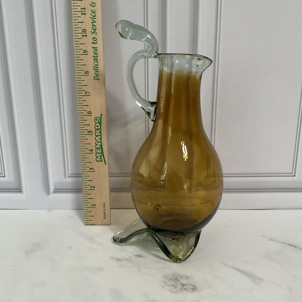 Hand Blown Glass Amber Pitcher with attached Clear Handle 10.5”Tall Clear Base